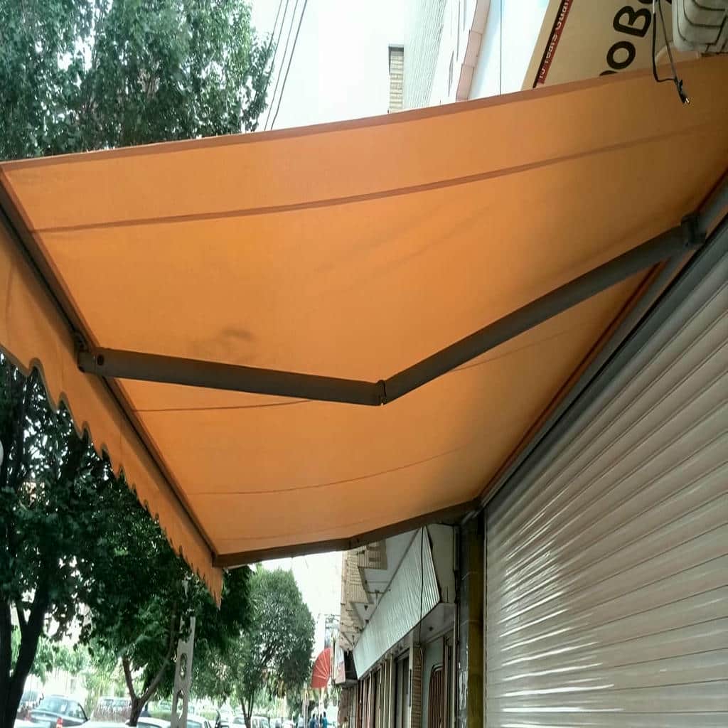 خرید سایبان برقی یزد با پارچه ضدآب و مقاوم