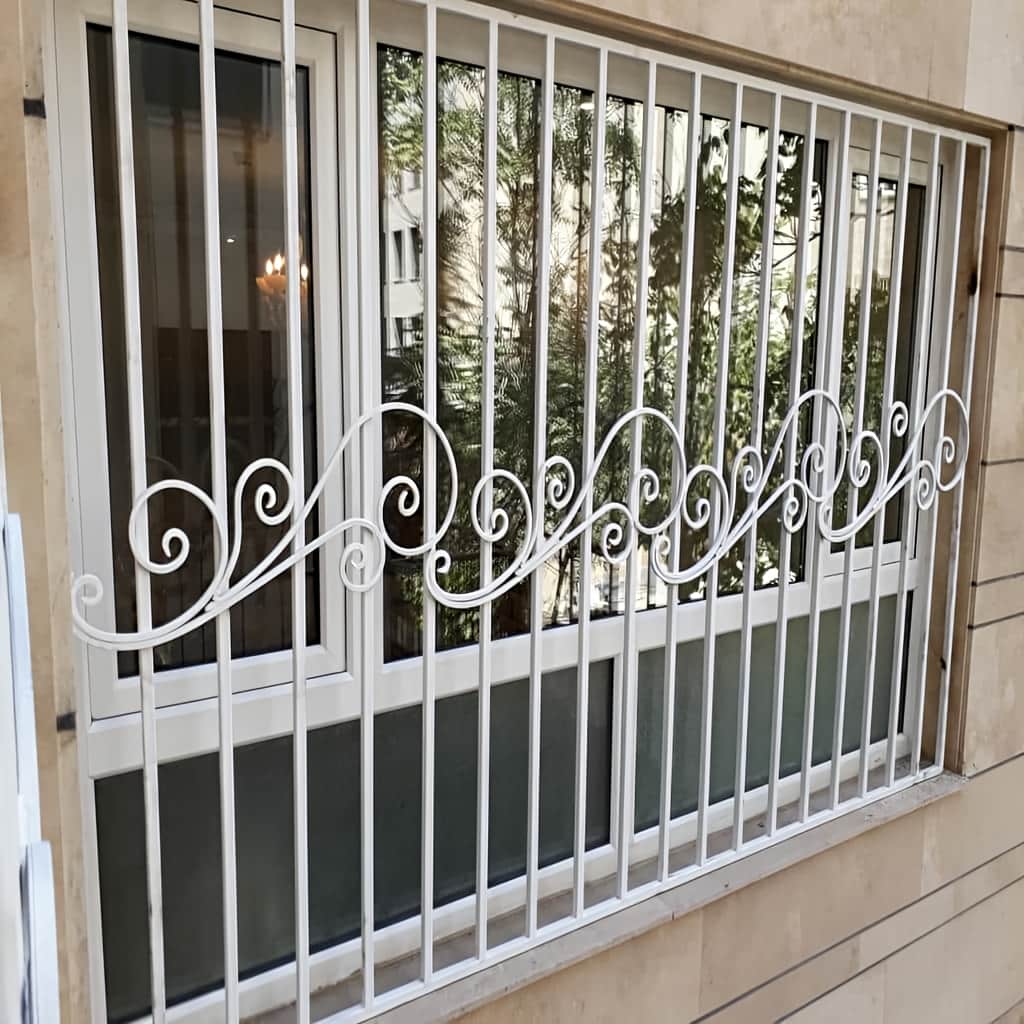 حفاظ پنجره مدل گل نیلوفری در یزد؛ زیبایی لطیف با امنیت مدرن