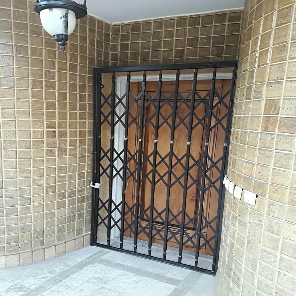 فروش حفاظ آکاردئونی درب واحد مسکونی در یزد برای ورودی آپارتمان