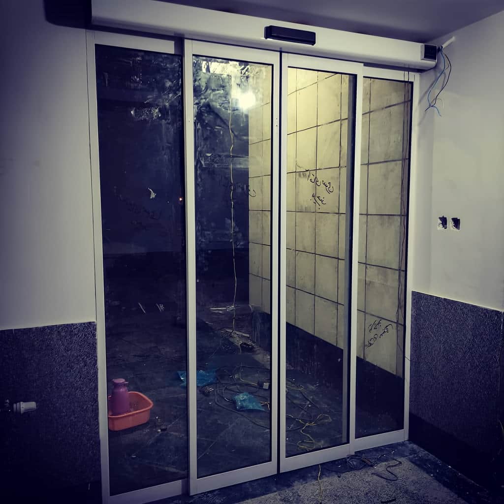 اجرای درب شیشه ای خودکار فریم لس سکوریت در یزد
