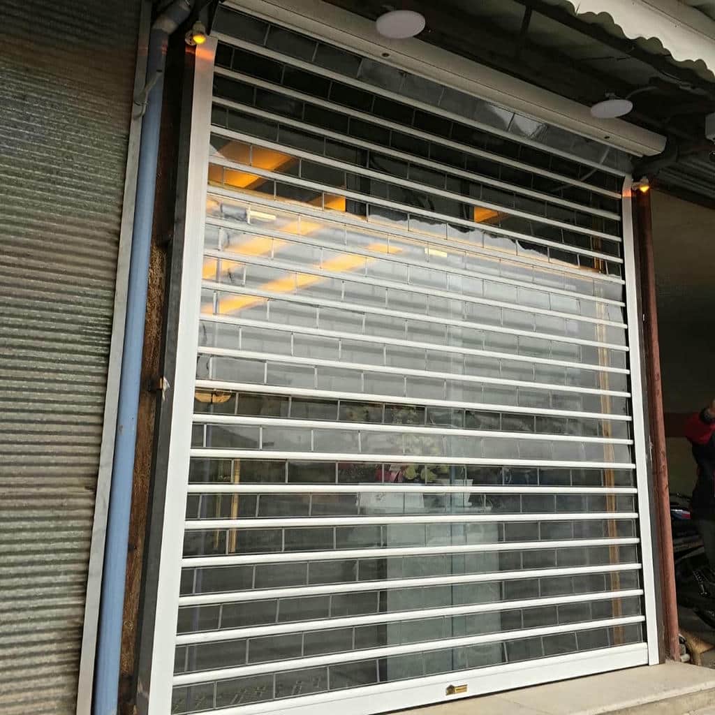 خدمات کرکره برقی رنگی نمای فروشگاه برای دهانه عریض در یزد