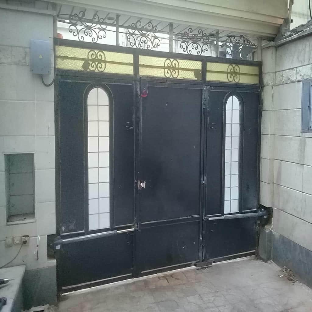 فروش جک درب پارکینگ بی صدا متناسب با وزن لنگه در یزد